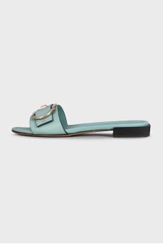Blue leather flip-flops with gold trim