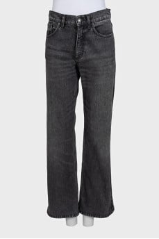 Wide-leg mid-rise jeans with distressing
