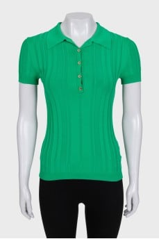 Green polo shirt with gold buttons