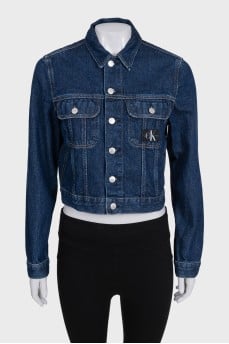 Cropped blue denim jacket with tag