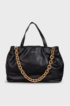 Black leather bag with gold chain