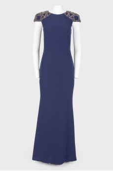 Dark blue evening dress in the floor