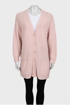 Pink knitted cardigan with a straight cut and a V-neck