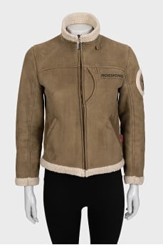 Green insulated sheepskin coat with logo