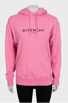 Pink hoodie with a hood and a branded logo