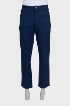 Men's blue trousers with a silver logo