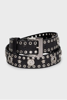 Leather belt decorated with eyelets and crystals