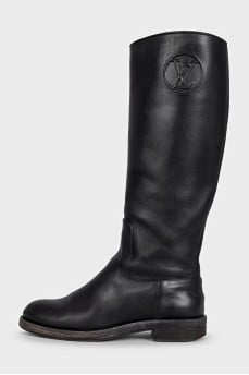 Black leather boots with brand logo