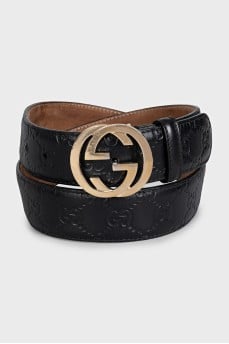Black leather belt with embossed signature monogram