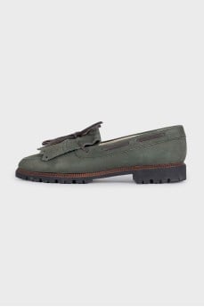 Green suede loafers with tassels