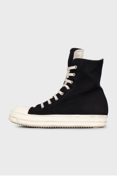 Black high-top sneakers with a zipper and laces