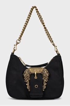 Black textile bag with a gold strap