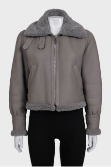 Gray leather sheepskin coat with fur and a high collar