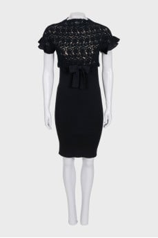 Black fitted dress with a bow and tag