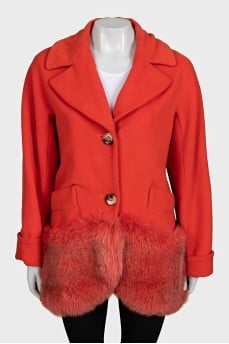 Orange coat decorated with fur