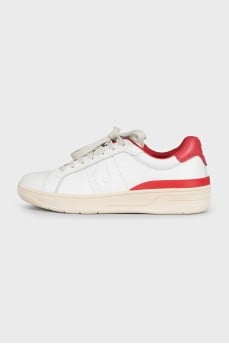 White leather sneakers with tag