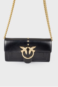 Black bag with a golden log of brand