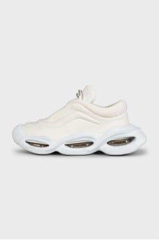 White textile sneakers with a shaped sole
