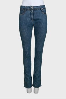 Blue straight-leg jeans with a distressed effect