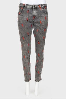 Jeans with embroidered chili