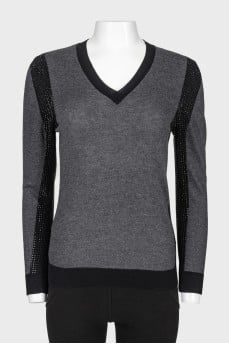 Pullover with black rhinestone inserts