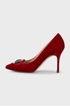 Red velvet pumps with decoration