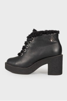 Leather boots on fur