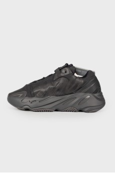 Black textile sneakers with tag