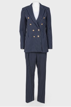 Striped suit with golden buttons