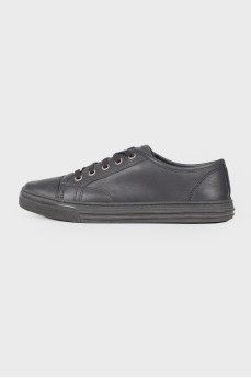 Black eyelet sneakers