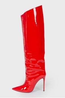 Red boots made of varnish leather