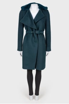 Coat on a belt with a tag