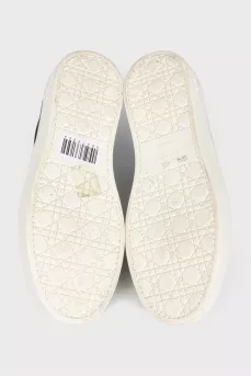Blue leather slip-ons with decor