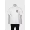 Men's white T-shirt with a patch