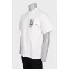 Men's white T-shirt with a patch