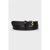 Black belt with gold buckle