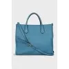 Leather bag with embossed logo