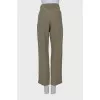 Green pants with tag