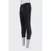 Men's black button-down jeans