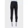Men's black button-down jeans