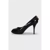 Patent leather black shoes with gold trim