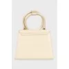 Beige leather bag Le Chiquito Noeud