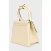 Beige leather bag Le Chiquito Noeud