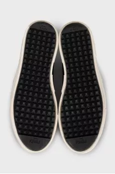 Black leather slip-ons with print