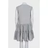 Loose-fitting dress with a flounce
