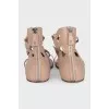 Leather lace-up sandals with zip closure