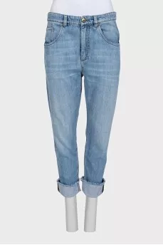 Tapered jeans with raw hem