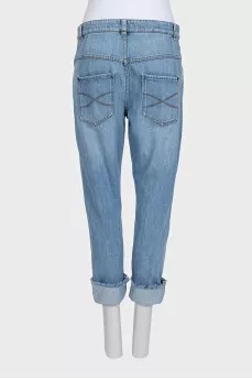 Tapered jeans with raw hem
