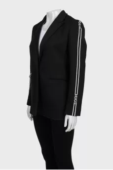 Black straight jacket with stripes on the sleeves