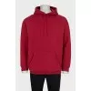 Men's red hoodie with a print on the back